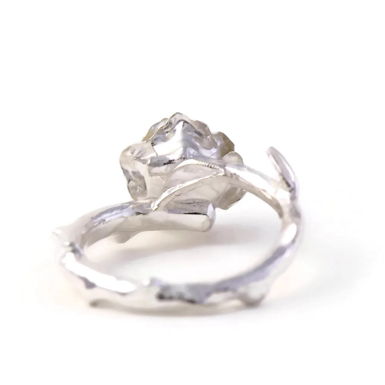 Delicate, small rose ring with a soft rose stem