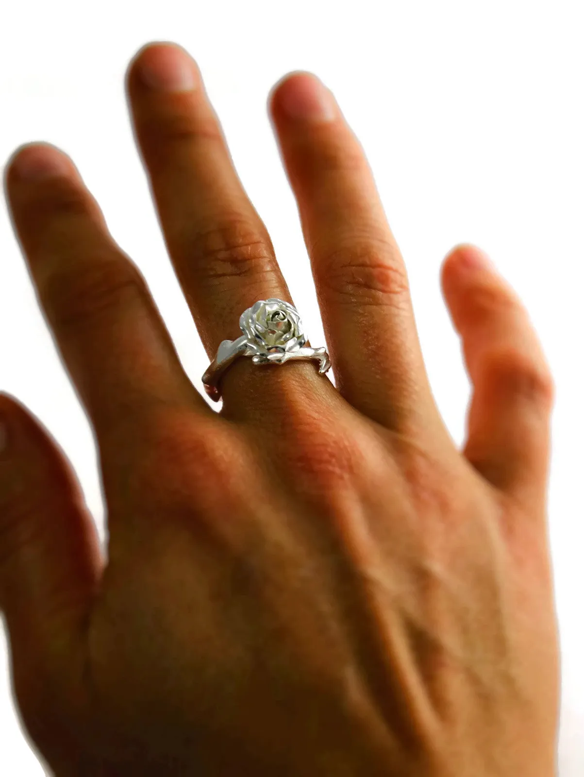Delicate, small rose ring with a soft rose stem